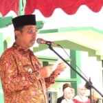 Foto: Bupati Rembang Abdul Hafidz saat menjadi inspektur upacara dalam peringatan Hari Amal Bakti (HAB) ke-77 di halaman Man 2 Rembang/mitrapost.com/Sri Lestari