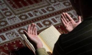 Muslim Man Is Reading The Koran