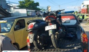 Foto : Dua kendaraan diangkut mobil polisi karena terlibat kecelakaan lalu lintas di Jalan Pati-Kayen turut Desa Jatiroto, Selasa (26/08/2025). (Dok. Satlantas Polresta Pati)