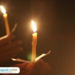 Ilustrasi aksi solidaritas menyalakan lilin/istock