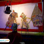 Foto: ilustrasi dalang memainkan wayang (sumber: istock) Foto: ilustrasi dalang memainkan wayang (sumber: istock)