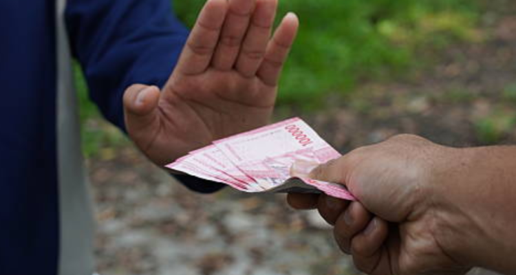 Ilustrasi UU Nomor 7 Tahun 2011 Sebut Penolakan Pembayaran Uang Tunai Dikenai Denda Rp200 Juta