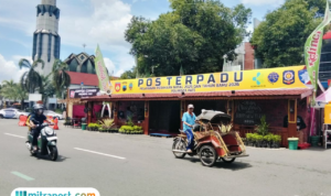 Foto : Pos Pengamanan Terpadu Nataru di Alun-alun Simpang Lima Pati, Sabtu (20/12/2025). (Sumber. Mitrapost.com/ Ilham)