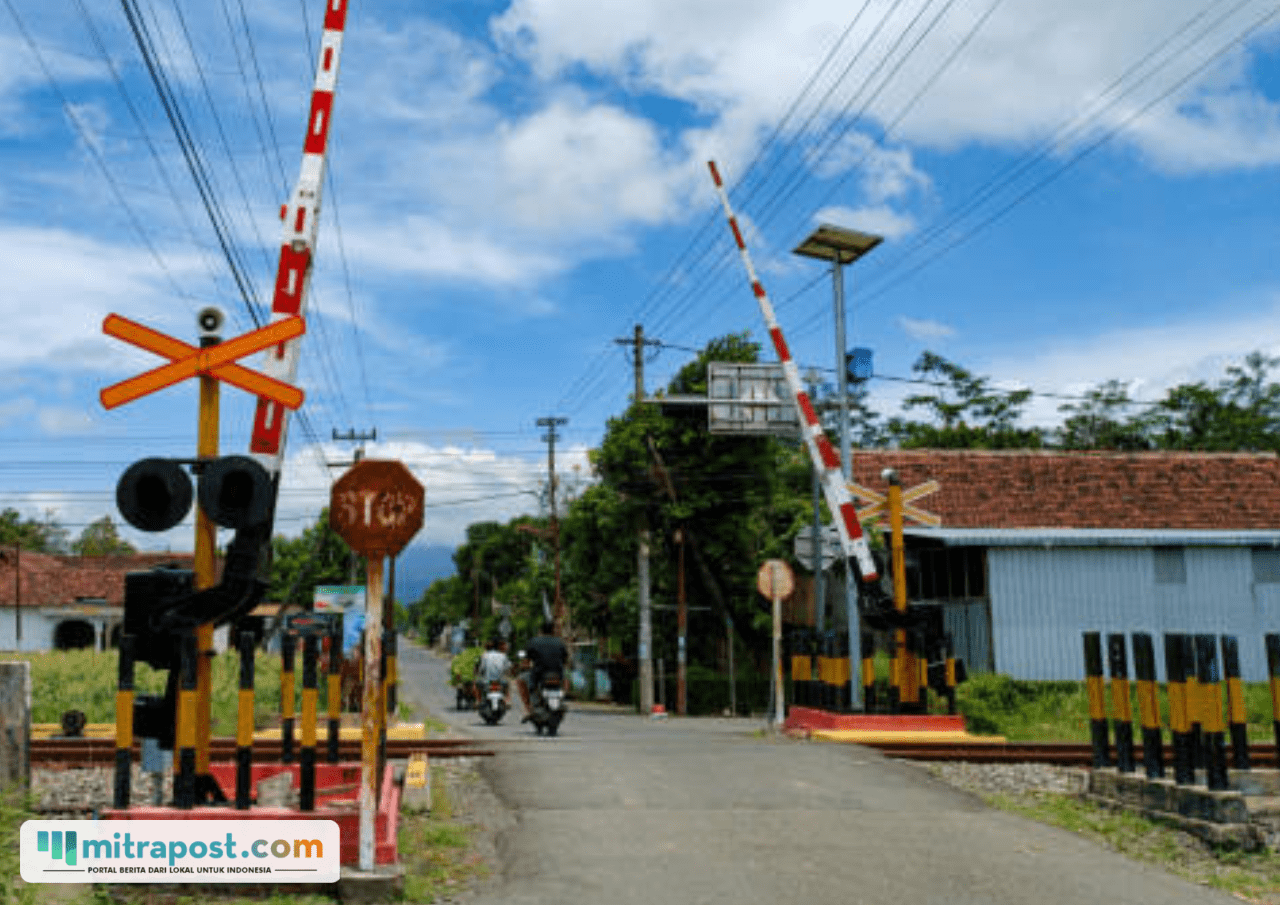 Ilustrasi palang perlintasan kereta api/istock