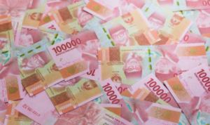 Ilustrasi uang rupiah Uang Rupiah Pecahan Rp100 Ribu dengan Tanda Tangan Purbaya Ramai Diburu Kolektor