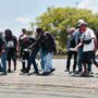 Foto : Aksi gabut bunga dan siram air doa di depan pintu gerbang Bupati Pati. (Sumber. Mitrapost.com/ Ilham)